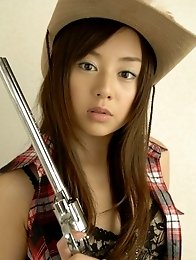 Adorable asian cowgirl tempts in her boots and jean shorts